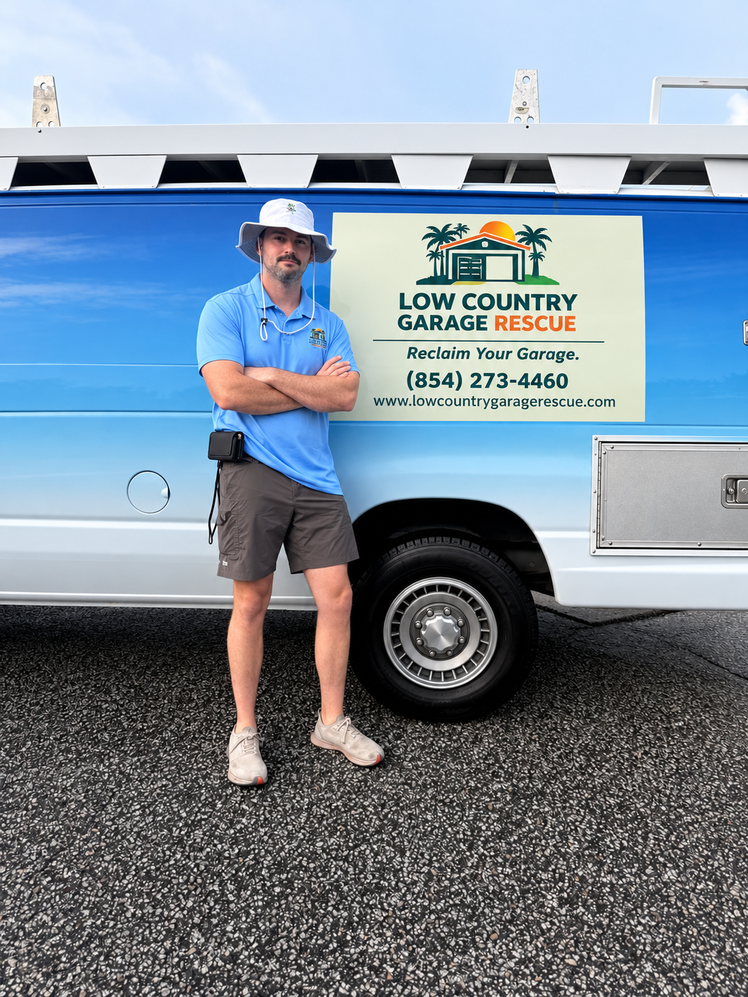 Gray Dyer beside the Lowcountry Garage Rescue van